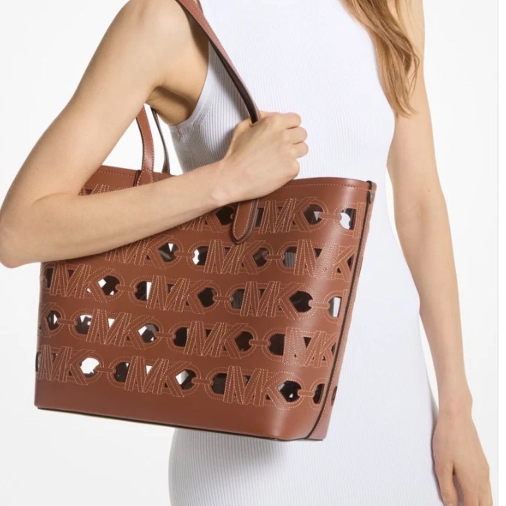 Michael Kors Large Eliza leather tote with cut outs clear liner EUC